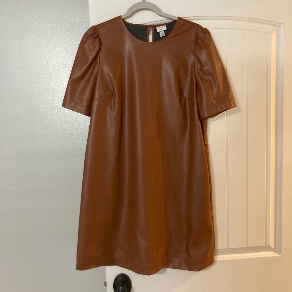 Women’s stylish brown faux leather mini dress